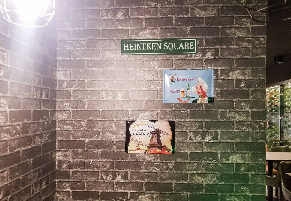 Brick wall with signs relating to the Netherlands