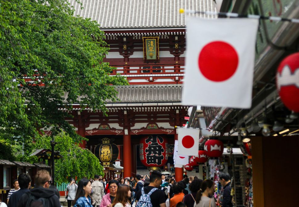 Kapanese temple with flags