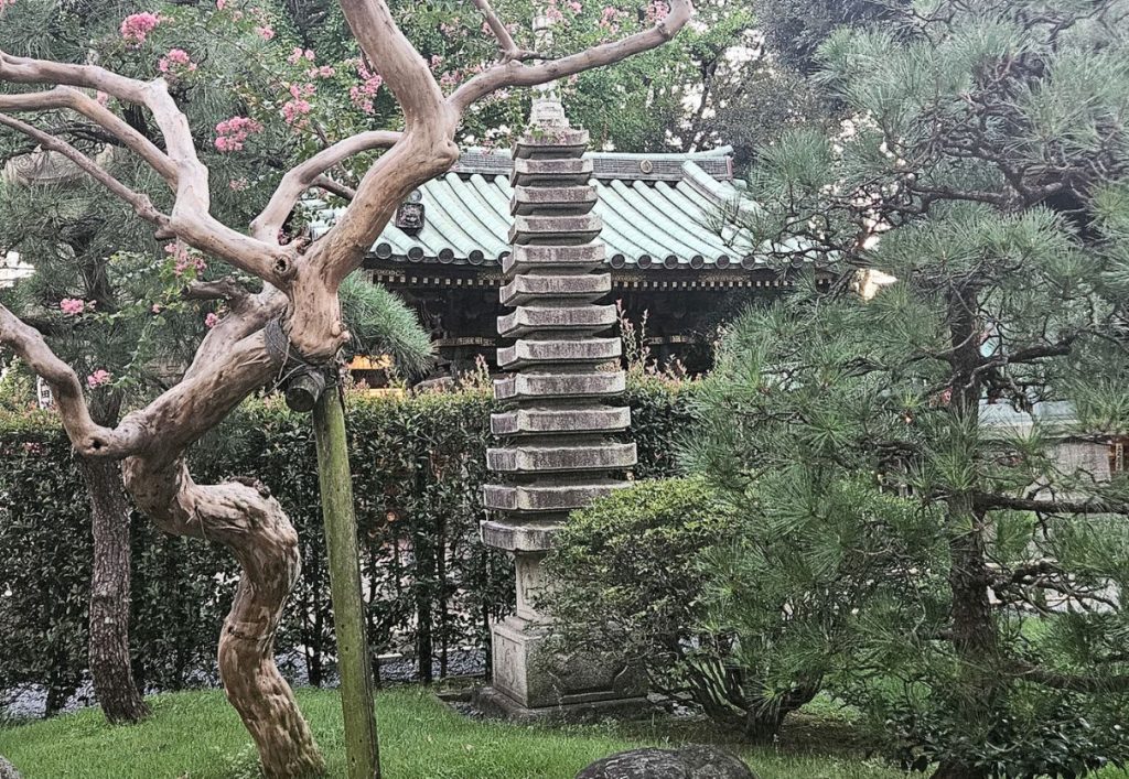 concrete pagoda is just one of the stuctures at thie temple in tokyo