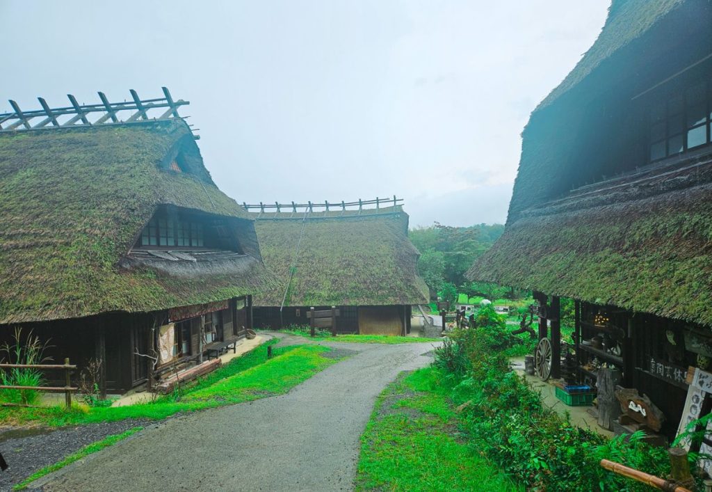 3 huts with the traditional roofs in Saiko Iyashi no Sato Nemba